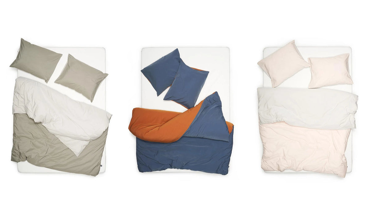 Comment styliser du linge de lit bicolore : jeux de faces et harmonies