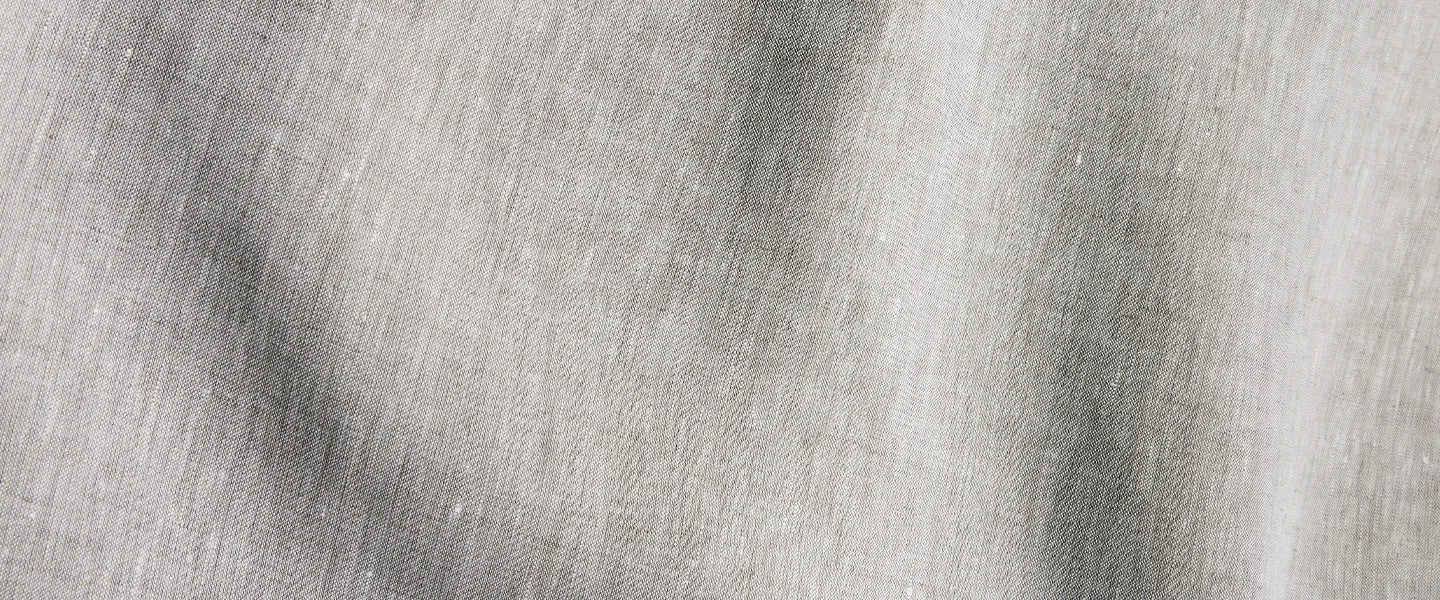 Detail eines Hotelzimmers mit Bettwaesche